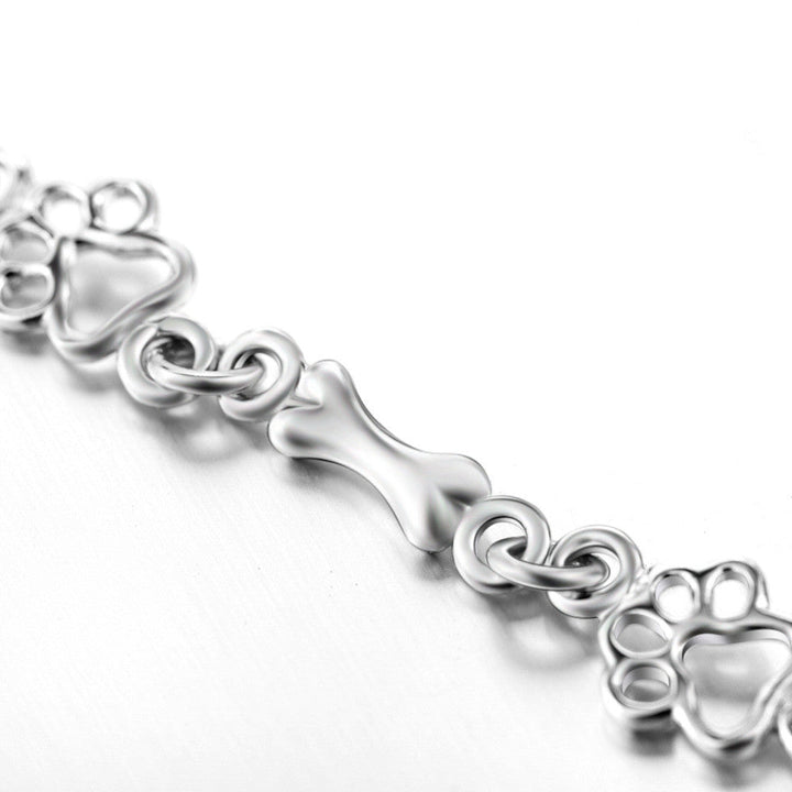 Armband mit Hundepfoten- und Knochenanhängern aus reinem Silber