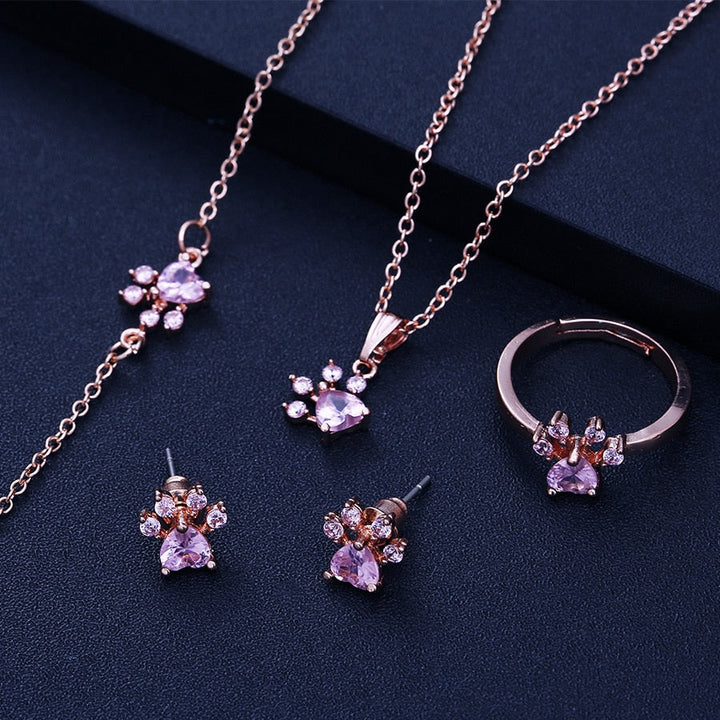 Pfoten Schmuck-Set für Frauen – 4-teilig | Roségold mit Zirkonia-Herz – Ring, Kette, Ohrringe & Armband